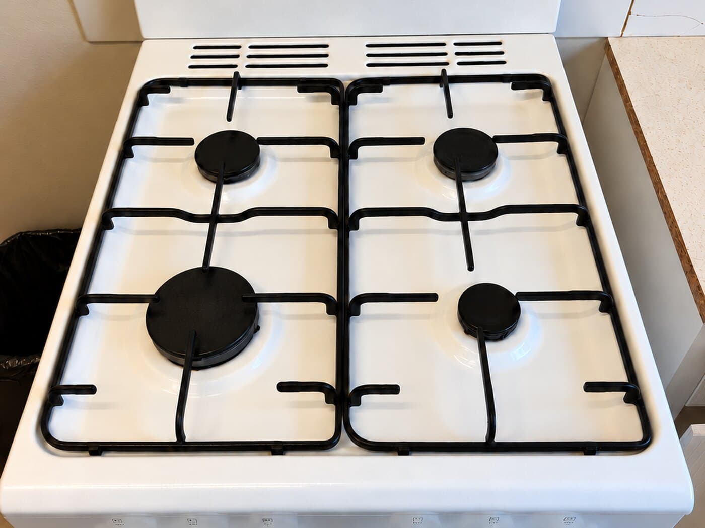 Gas cooktop before and after an end of lease clean
